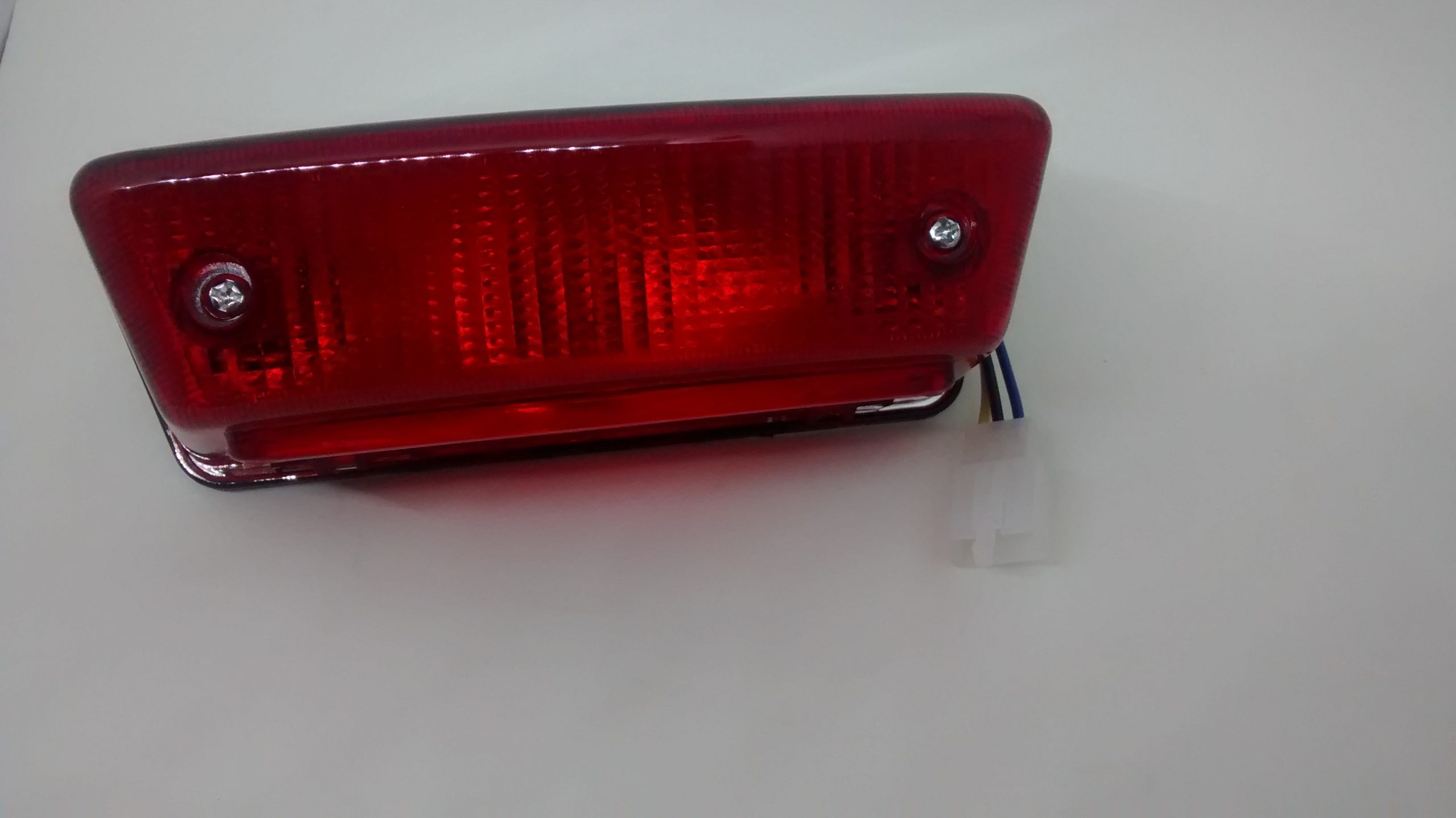 FARO TRAS. YAMAHA 125 YBR....................SUNIK